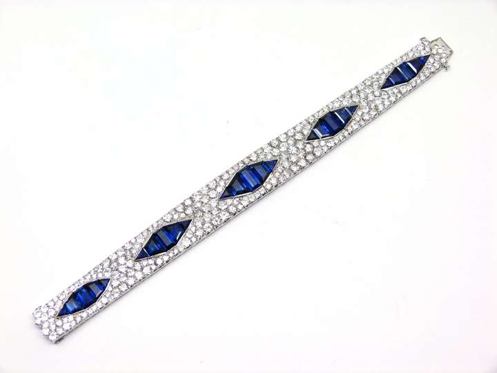 Sapphire and diamond articulated strap bracelet